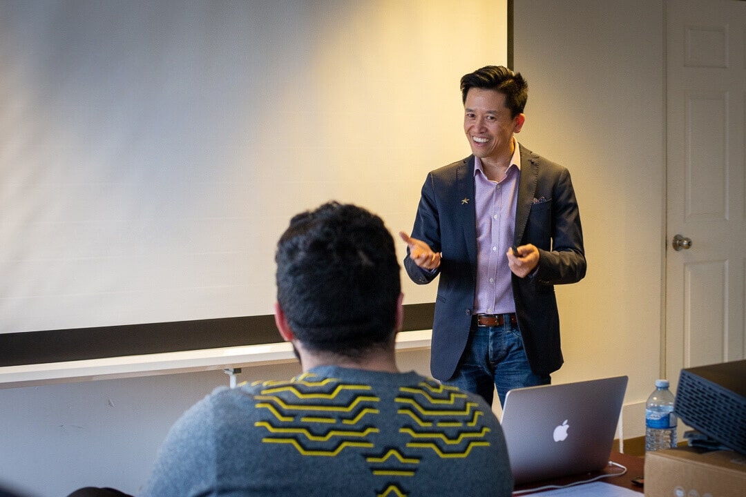 Eric Lee coaching a room of business owners